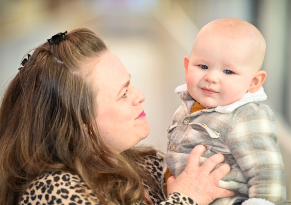 A photo of a child and his mother