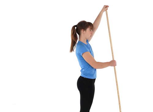 A woman using a stick to move their arms