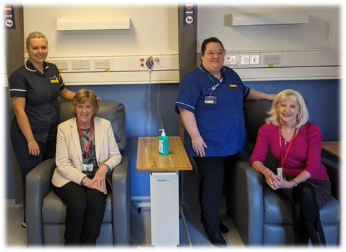 A photo of Sherwood Forest Hospitals staff with the donated recliner chairs