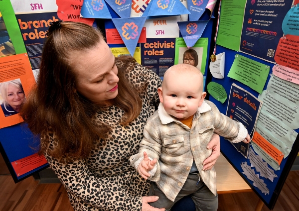 A photo of a child and his mother