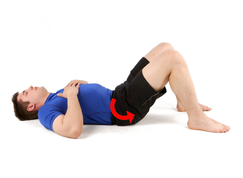 Person performing a pelvic tilt