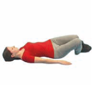 Lying on your back with your knees bent to the side