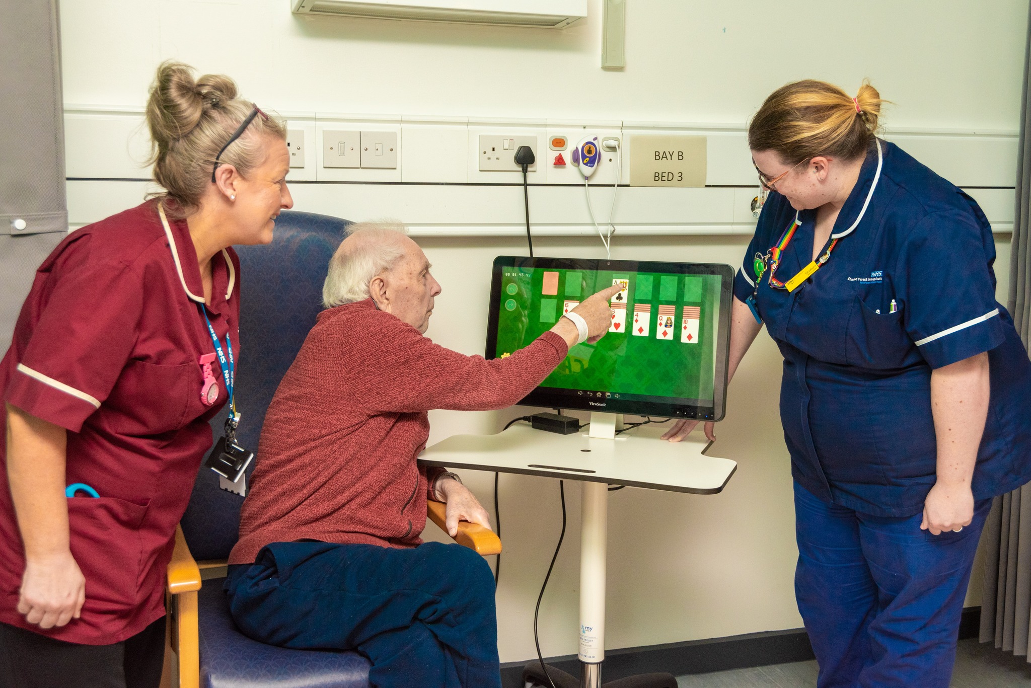 Clinicians with a patient