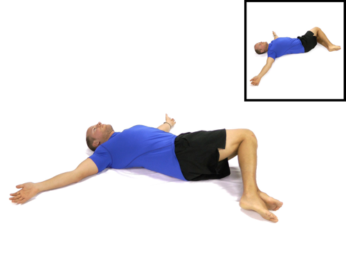 Person lying on their back, rolling their knees from side to side